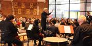 Conductor, orchestra and audience