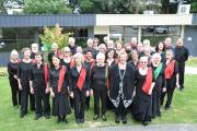 The choir poses for a pre-concert photo